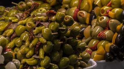 Tapas of olives and peppers. Typical Spanish tapas