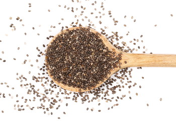 chia seeds and wooden spoon isolated on white