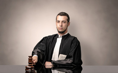 Oldscool young judge in gown
