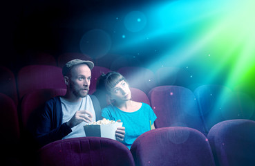 Teenager couple watching movie