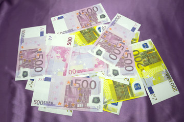 200, 500 Euro notes background texture - mingled pile