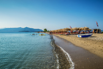 Evia, Greece july 20, 2014: A beautiful beach with a cafe bar and a beach volleyball court