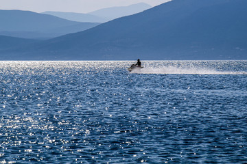 Naklejka premium Jet ski in the distance