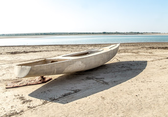 old broken yacht on the beach