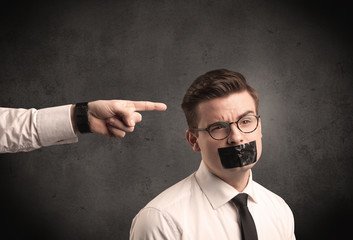 Business hand pointing at employee