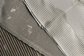 Gray striped old corrugated cardboard, background