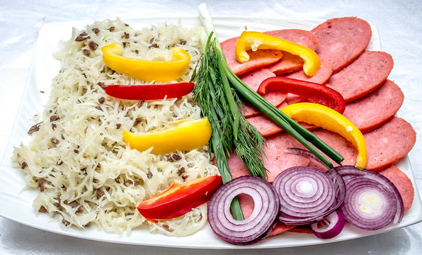 Sausage and vegetables sliced