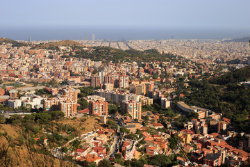 Obraz premium View on Barcelona city and mediterranean sea from Tibidabo hill