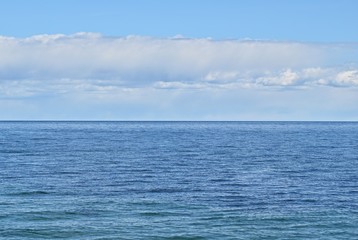 Naklejka na ściany i meble blue sea and sky background