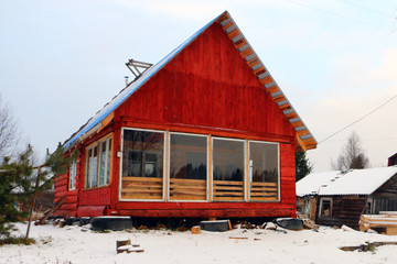 the wooden house in winter