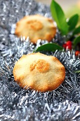 Christmas decorations with mince pie sitting on a table no people stock photo