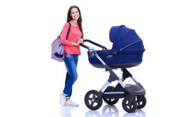 Full length portrait of a mother with a stroller, isolated on white background. Young mom