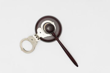 Judge gavel and handcuffs. Law concept photo