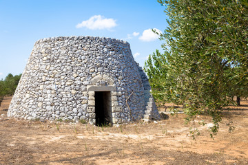 Fototapeta na wymiar Puglia Region, Italy. Traditional warehouse made of stone