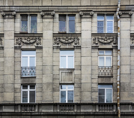 The historic building is decorated with bas-relief in the city of St. Petersburg