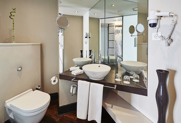 clean bathroom style and interior decorative design, wooden cabinets