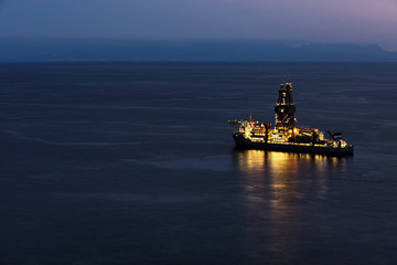 Offshore oil drilling rig on the south cost of Tenerife island on the North Atlantic Ocean. The sun...