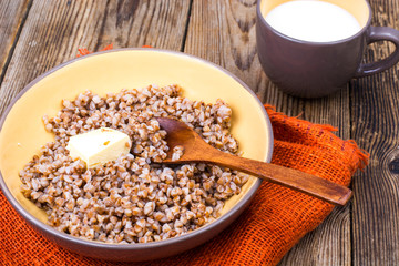 Delicious buckwheat porridge with butter and milk