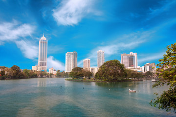 Fototapeta na wymiar Colombo, Sri Lanka - 11 February 2017: Panorama of Beira Lake and business towers skyscrapers in Colombo, Sri Lanka