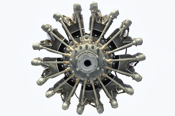 Old gasoline aircraft engine on a white background