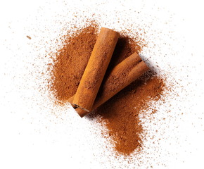 cinnamon sticks with powder isolated on white background