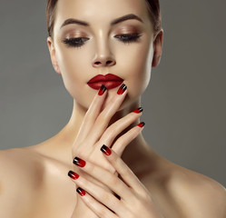 Beautiful model girl with red and black  french manicure on nails . Fashion luxury makeup . Beauty ...