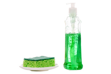 Dishwashing bottle sponge and dishes isolated