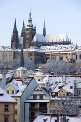 Christmas snowy Prague Lesser Town with gothic Castle, Czech republic