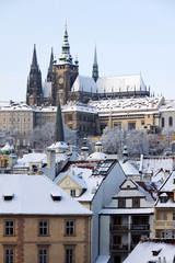 Christmas snowy Prague Lesser Town with gothic Castle, Czech republic