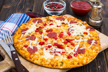 Delicious homemade pizza with salami