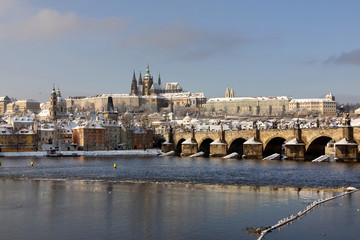 Christmas snowy Prague Lesser Town with Charles Bridge and Prague Castle, Czech republic