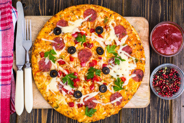Delicious homemade pizza with salami