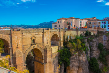 Naklejka na ściany i meble New bridge. View of the New Bridge in the city of Ronda, province of the city of Malaga. Andalusia, Spain. Photo taken – 13 n ovember 2017.