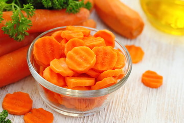 Salad with carrot, oil and greens