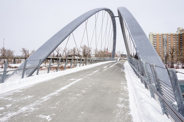 Empty Pedestrian Bridge on a Snowy Winter Day. Calgary, AB, Canada.