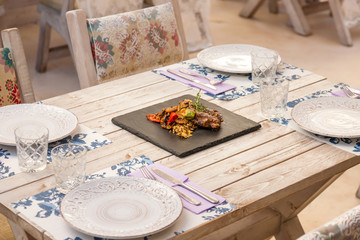 Obraz na płótnie Canvas Grilled steak with vegetables and rice