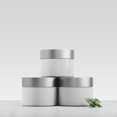 White cream jars, white background