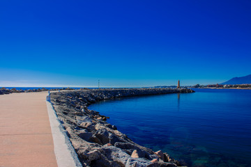 Obraz premium Lighthouse. Port of Puerto Banus, Marbella, Costa del Sol, Andalusia, Spain.