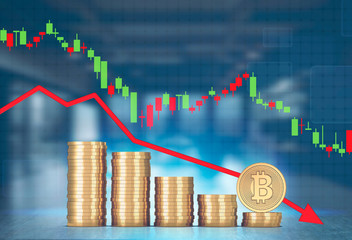 Stacks of bitcoins, falling graph