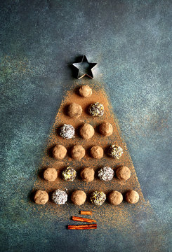 Abstract Christmas Tree Made From Chocolate Truffles.Top View With Copy Space.