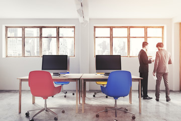 Blue and red chairs office interior toned
