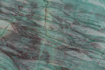 Dark luxury quartzite texture close up.