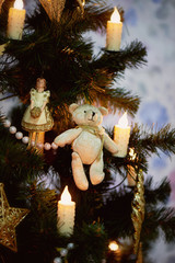 toy on the Christmas tree bear. New year mood. Decoration for home