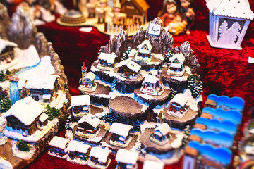 Elements of Christmas New Year decoration on Christmas Market in Innsbruck, Austria with Christmas tree, toys and souvenirs