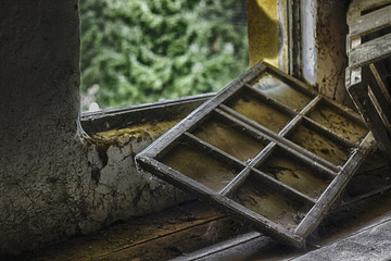 Fototapeta na wymiar old mill window