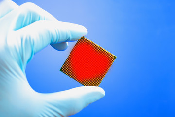 processor on the hand in the glove. cpu. symbol of the heart.