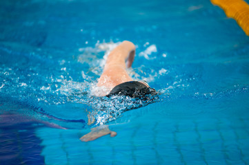 swimmer swims
