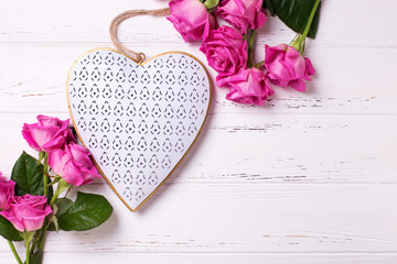 Decorative heart and frame from pink roses flowers