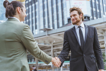 Businessman shaking hands with partner. Concept of deal successful and negotiation agreement.