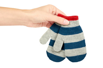 Warm winter children's gloves in hand isolated on white background. Sale and buy